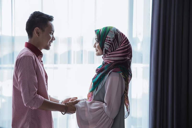 romantic muslim couple holding hands resize